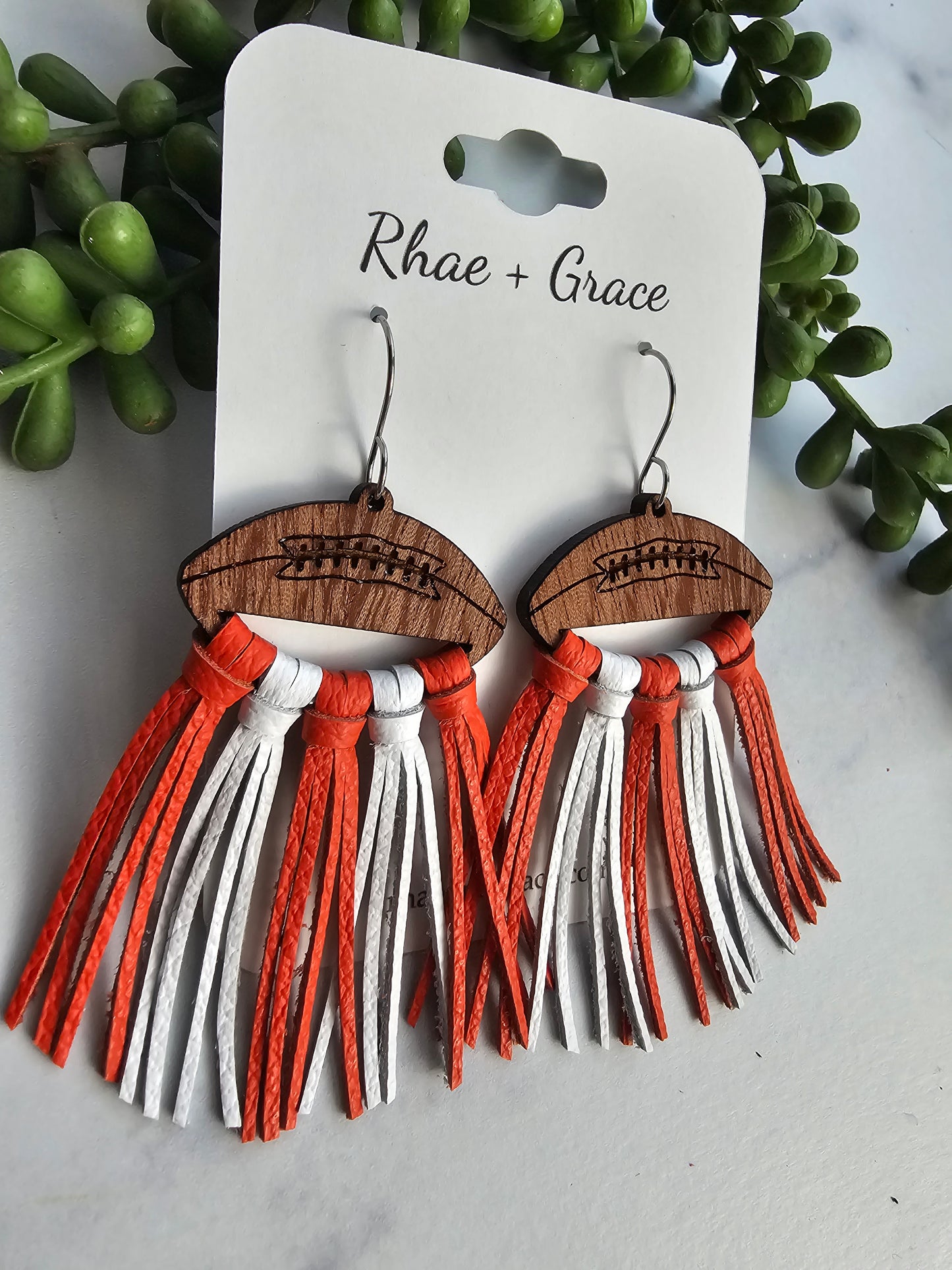 Orange & White Leather Fringe Football Statement Earrings